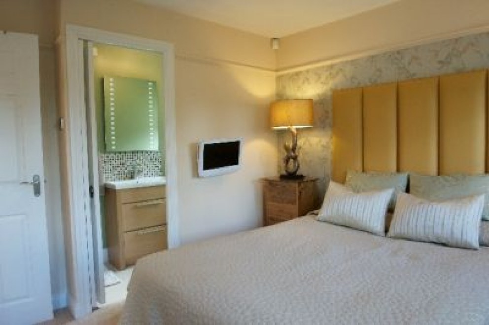 Mews house | Master bedroom through to en-suite | Interior Designers